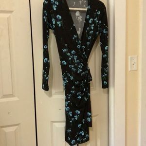Flattering wrap; long sleeve; never worn